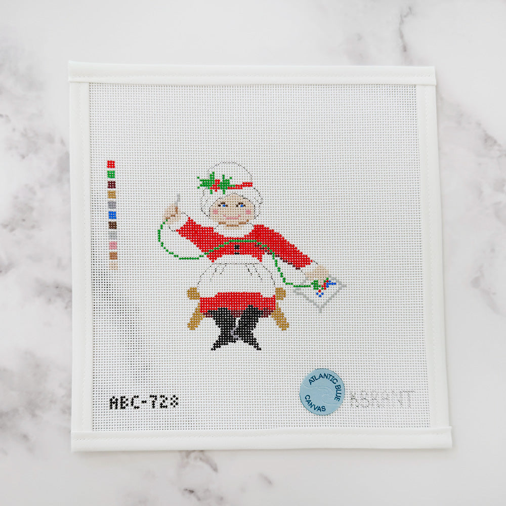 Needlepointing Mrs. Claus